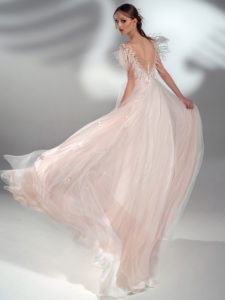 A-line wedding dress with feather decor and cup sleeves, available in pink, ivory