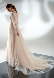 Style #2102, puff sleeve A-line wedding dress with V-plunging neckline, available in cream–nude, cream, ivory
