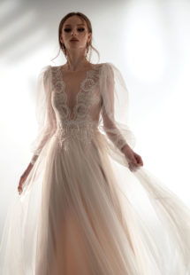 Style #2102, puff sleeve A-line wedding dress with V-plunging neckline, available in cream–nude, cream, ivory