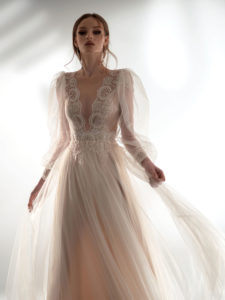 Puff sleeve A-line wedding dress with V-plunging neckline, available in cream–nude, cream, ivory