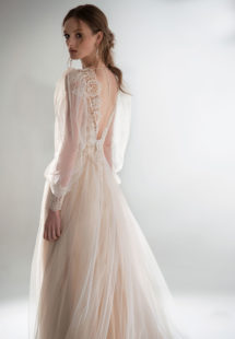 Style #2102, puff sleeve A-line wedding dress with V-plunging neckline, available in cream–nude, cream, ivory