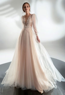 Style #2102, puff sleeve A-line wedding dress with V-plunging neckline, available in cream–nude, cream, ivory