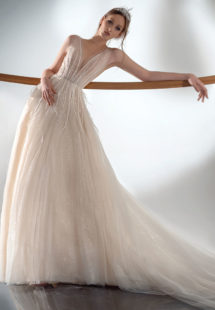 Style #2103, sparkling A-line wedding dress with V-neckline, available in ivory-nude, ivory