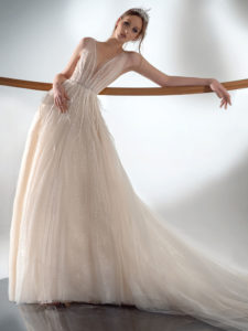 Style #2103, sparkling A-line wedding dress with V-neckline, available in ivory-nude, ivory