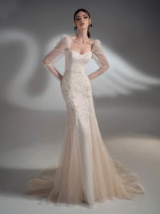 Cream sparkly fit and flare wedding dress with long sleeves