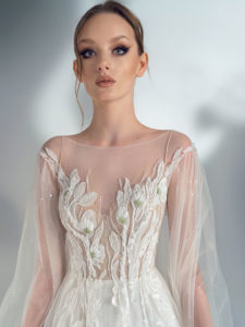 Style #2107, cape sleeve A-line wedding dress with floral applique, available in ivory-nude, ivory (lace is possible only as in the photo)