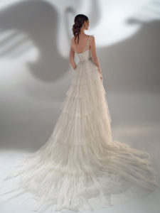 Sparkly Ball gown wedding dress with tiered skirt