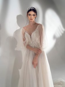 Sparkly A-line wedding dress with off-the-shoulder sleeves, available in cream, ivory