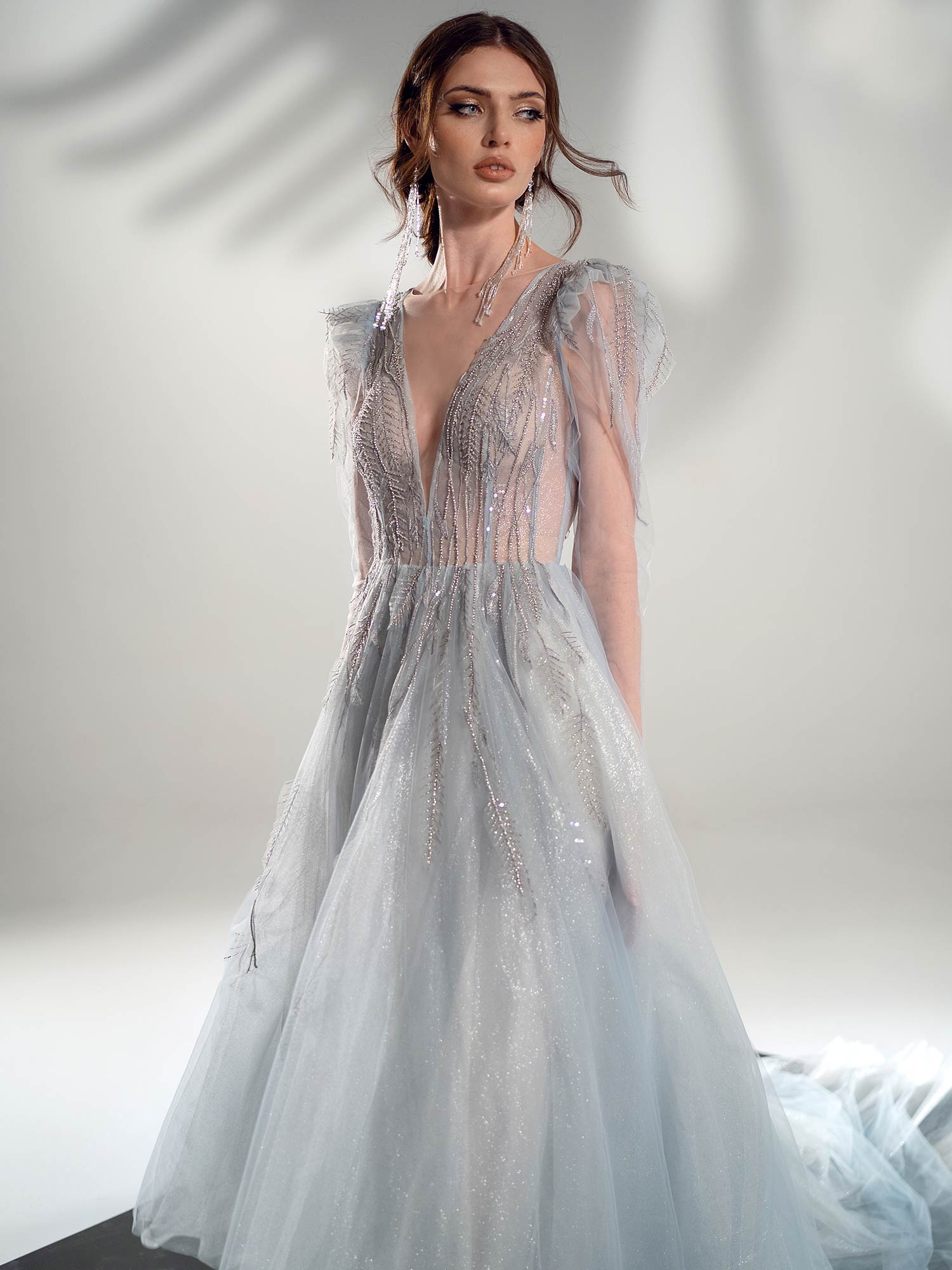 Style #2111, long-sleeve A-line wedding dress with open V-back, available in grey-blue, ivory