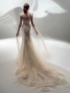 Sparkly fit and flare wedding dress with long bell sleeves, available in cream, ivory