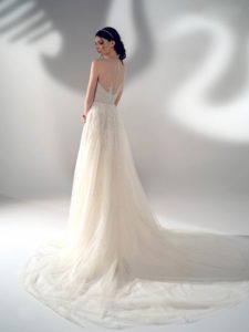 A-line wedding dress with illusion halter neckline and leaf embroidery