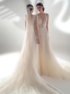 A-line wedding dress with illusion halter neckline and leaf embroidery