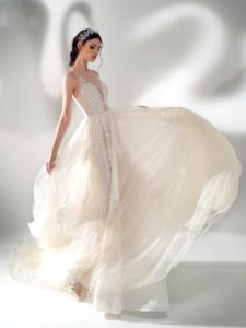A-line wedding dress with illusion halter neckline and leaf embroidery