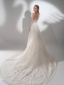 Style #2120, beaded lace ball gown with long sleeves, available in ivory