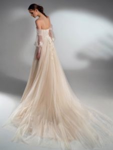 Off the shoulder A-line wedding dress with detachable sleeves, available in cream–nude, ivory