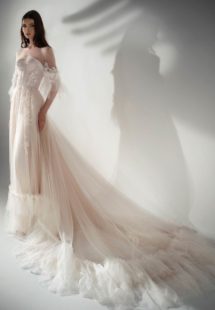 Style #2122, three-quarter sleeve A-line wedding dress with ruffles, available in cream-nude, ivory