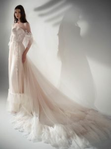 Three-quarter sleeve A-line wedding dress with ruffles, available in cream-nude, ivory