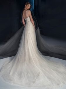 Cream sparkly A-line wedding dress with bustier top