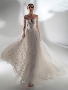 Style #2125, off the shoulder sleeve A-line wedding dress with pearls, available in ivory