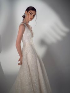 Cream sparkly lace ball gown wedding dress with V-neck