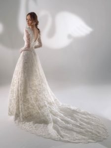 Cream sparkly lace ball gown wedding dress with long sleeves