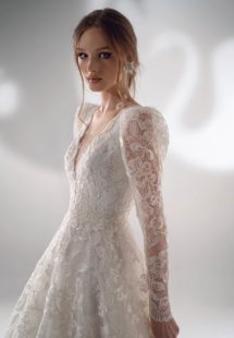 Style #2128b, sparkly lace ball gown wedding dress with long sleeves, available in cream