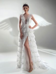 Sparkly A-line wedding dress with tiered skirt, available in white-ivory, ivory