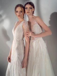 Sparkly sheath wedding dress with V-neck and A-line wedding dress with illusion halter neckline and leaf embroidery