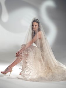 Sparkly A-line wedding dress with V-neckline, available in cream-nude, cream
