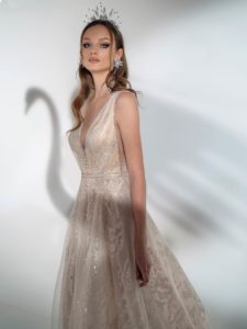 Sparkly A-line wedding dress with V-neckline, available in cream-nude, cream
