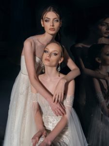 Beaded lace sheath wedding dress with sweetheart neckline, available in cream-nude, cream