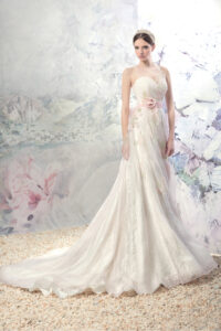 Sleeveless A-line wedding dress with illusion neckline and flower decor