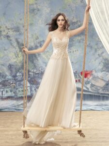 Sheath wedding dress with lace top and illusion back