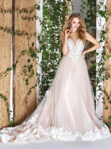 Ball gown wedding dress with sweetheart neckline and lace scalloped hem