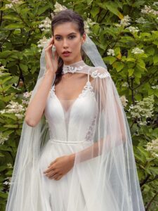 Spaghetti-strap A-line wedding dress with detachable cape