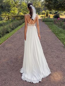Spaghetti-strap sheath wedding dress with slit on the skirt and open back