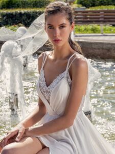 Spaghetti-strap sheath wedding dress with slit on the skirt and open back