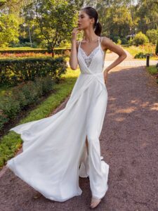 Spaghetti-strap sheath wedding dress with slit on the skirt and open back