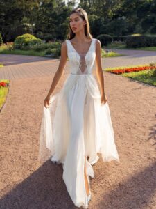 Sleeveless A-line wedding dress with a unique plunging neckline
