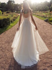 Sleeveless A-line wedding dress with a unique plunging neckline