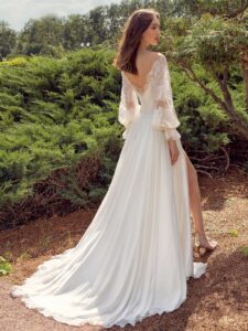 Off the shoulder sheath wedding dress with lace bishop style sleeves; available in ivory-nude, ivory, white