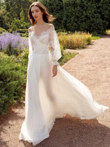 Off the shoulder sheath wedding dress with lace bishop style sleeves; available in ivory-nude, ivory, white