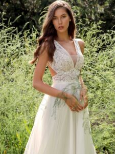 A-line wedding dress with a deep V-neckline lace bodice and tulle skirt