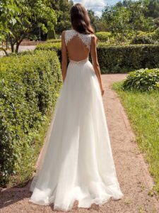 A-line wedding dress with a deep V-neckline lace bodice and tulle skirt