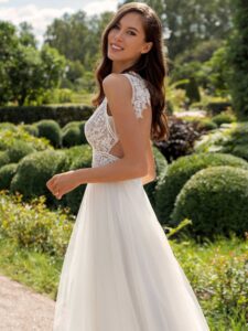 A-line wedding dress with a deep V-neckline lace bodice and tulle skirt