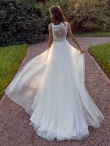 A-line wedding dress with a deep V-neckline lace bodice and illusion back