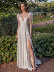 Long-sleeve sheath wedding dress with extended shoulders