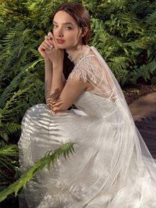 Shimmering lace A-line wedding dress with beaded shoulders