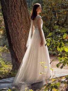 Shimmering lace A-line wedding dress with beaded shoulders