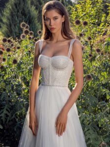Bustier style A-line wedding dress with pearl waistline